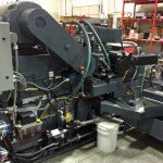 Customized CNC upgrade simplifies railcar axle grinding