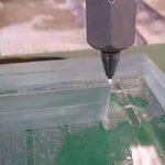 Machining glass with abrasive waterjet